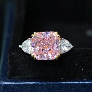 Luxurious Pink and Gold Diamond Ring with Halo Setting